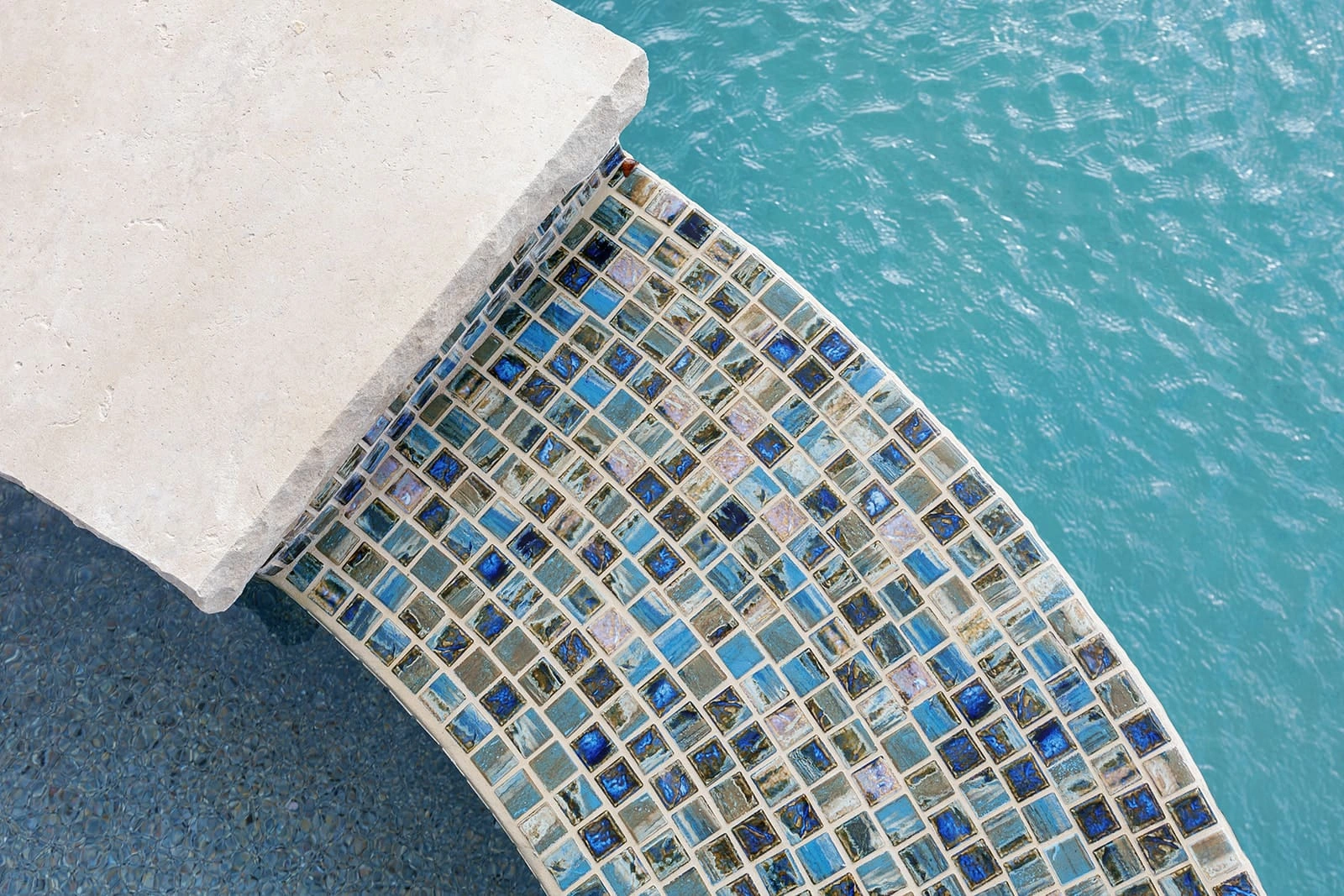 McDonald11 Luxury pool design featuring a custom square spa with premium tile finish - Redfin Pools